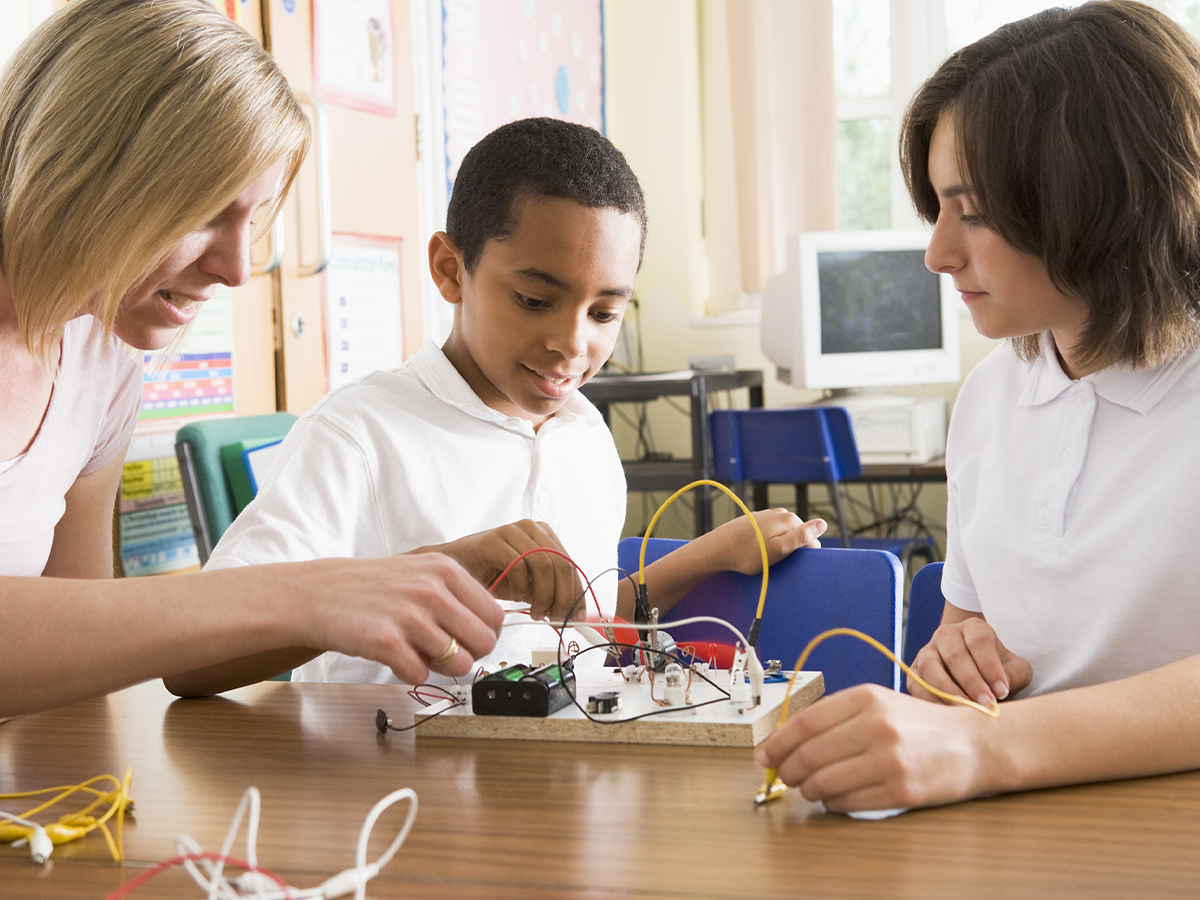 Young boy applying what he has learned to solve problems