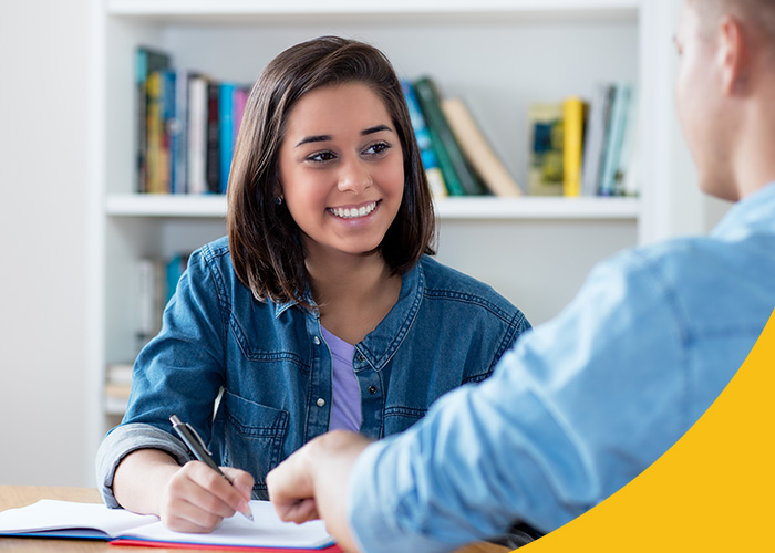 photo of high school girl working with a tutor