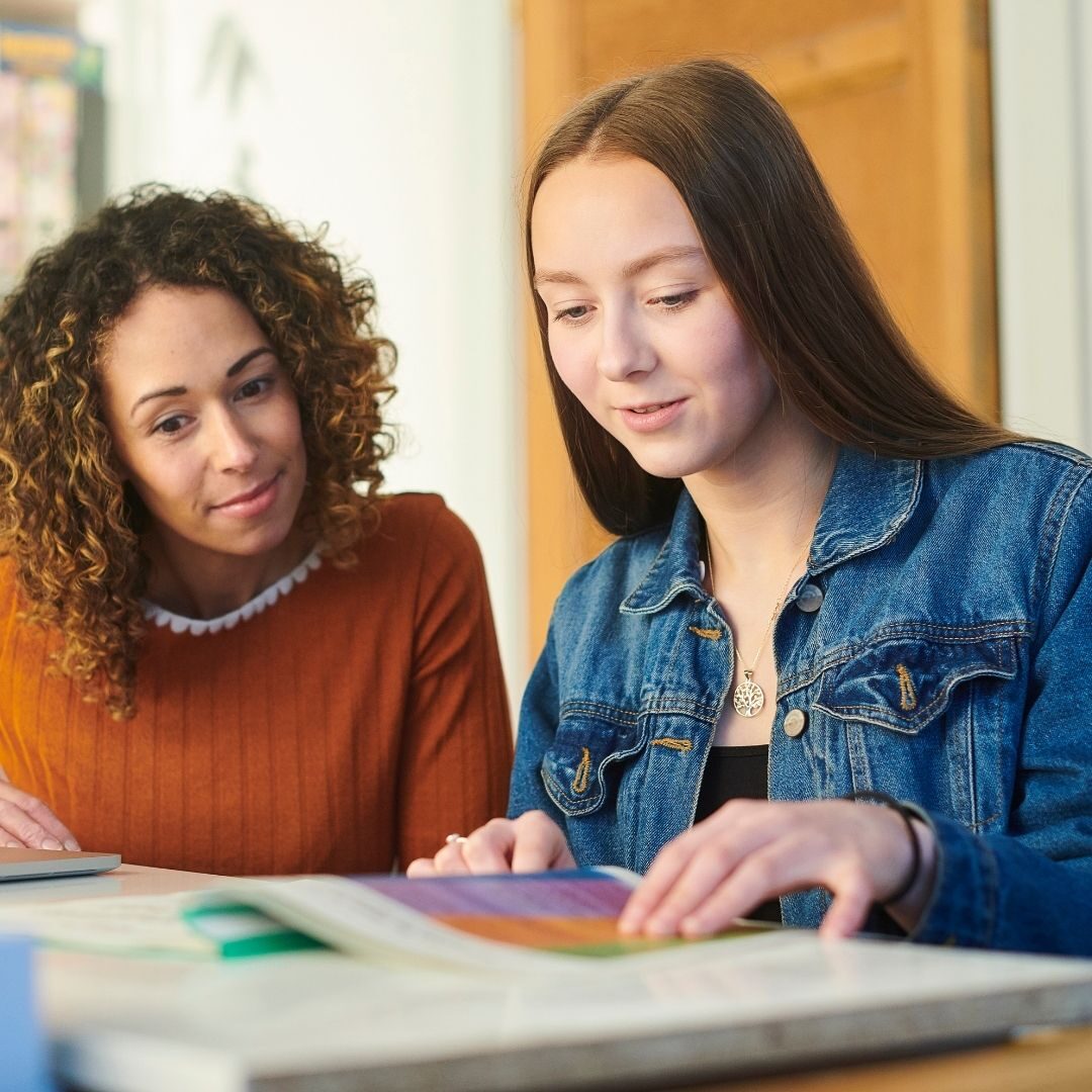 Photo of a student and tutor